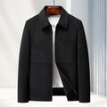Men's slim fit casual coat in dark blue shown on a model, featuring a thickened design and a neat collar.
