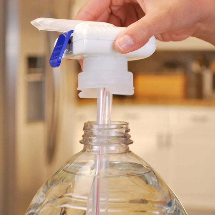 Manual beverage pump with long silicone straw and blue press handle on a bottle