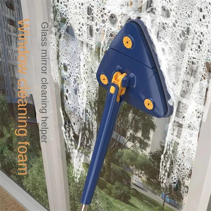 Blue triangular cleaning mop with a 360-degree rotating head and extended stainless steel pole on a tile floor.