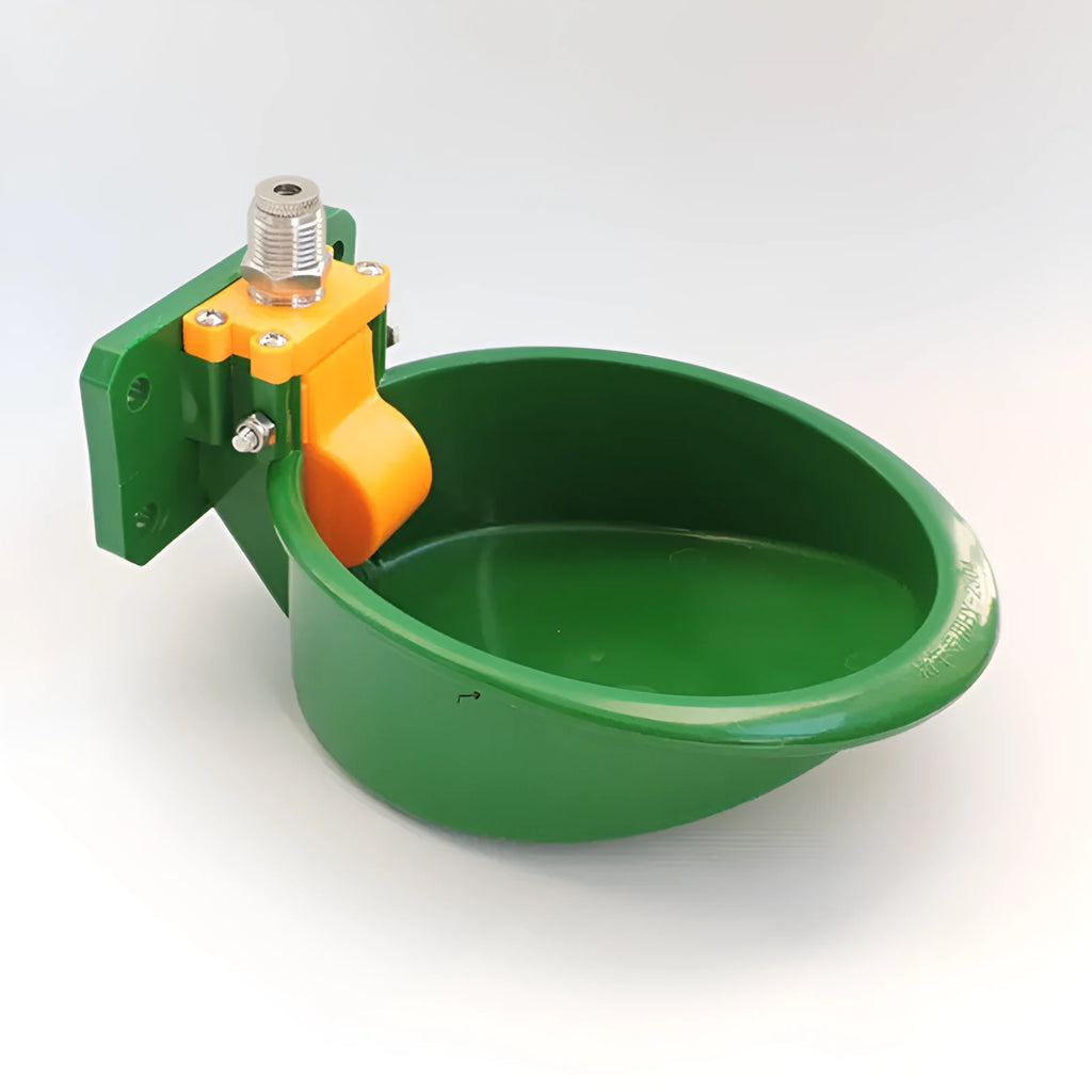 Green plastic drinking bowl for sheep with specialised nozzle design