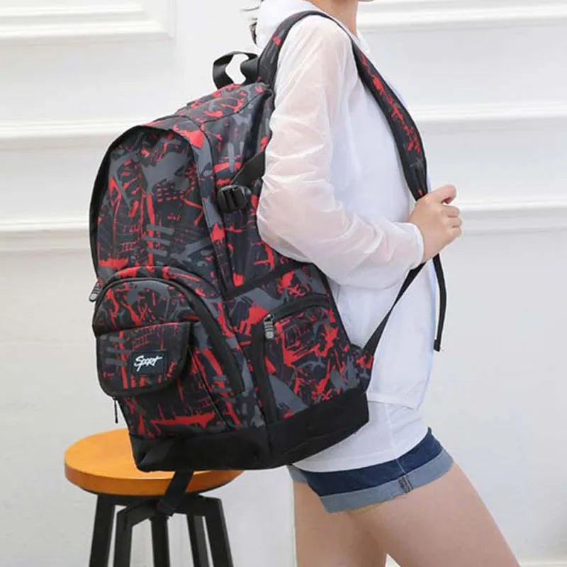 Blue classic nylon backpack with large main compartment and adjustable padded shoulder straps.