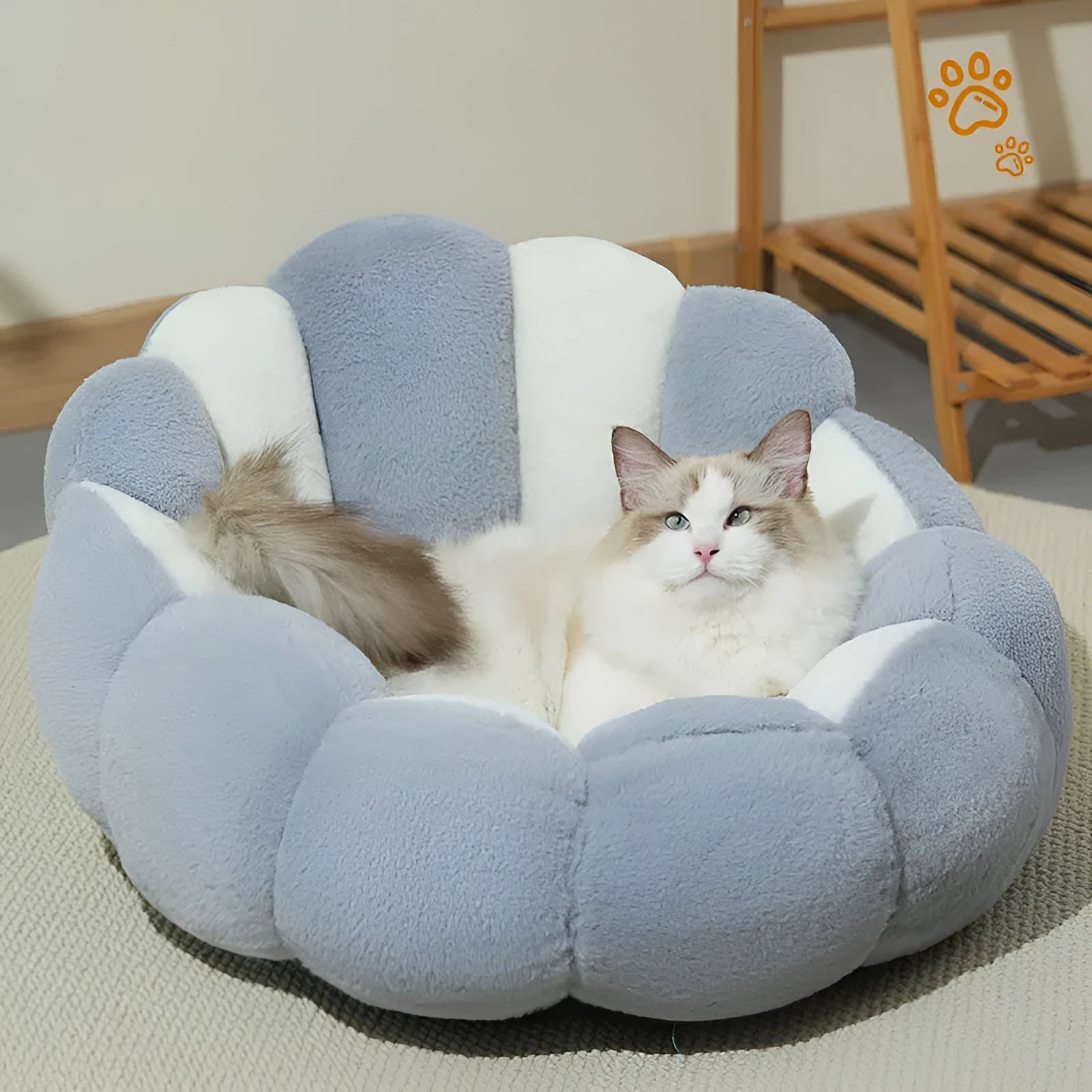 Greyish-white rabbit fur lined pet shell nest bed for cats and small dogs in three sizes.