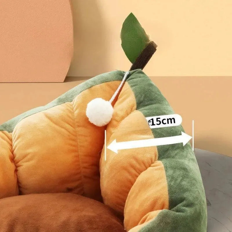 Oval pet bed with cotton cover and raised sides in coffee colour, shown with small cat