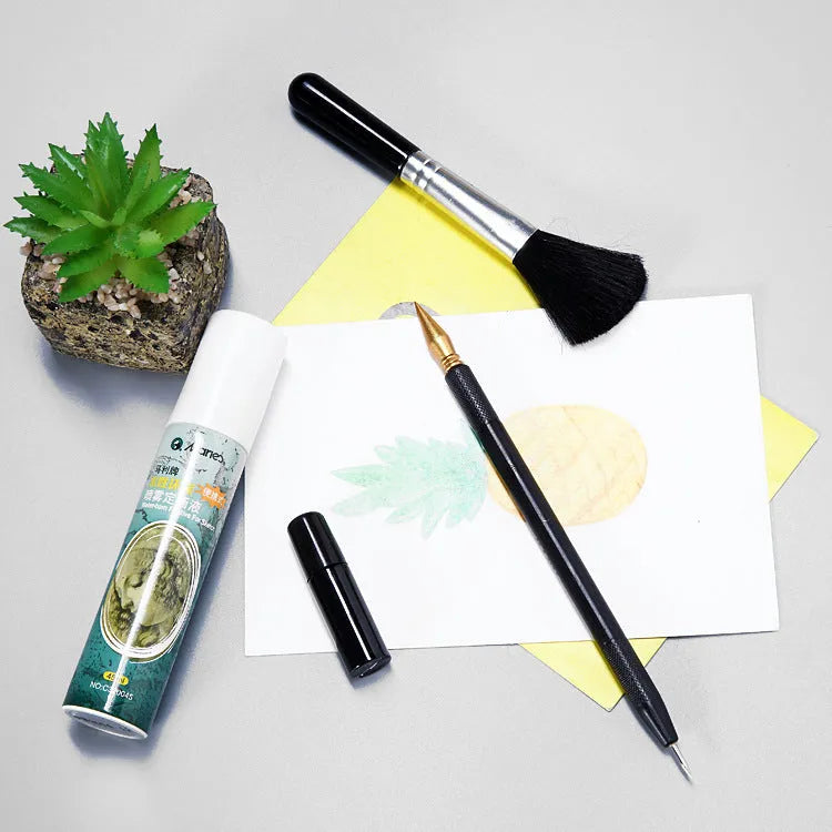 Scraping painting tools set with multiple art tools on white card surface