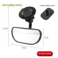Black 360-degree rotating car rearview mirror with a suction cup mount on a windscreen.