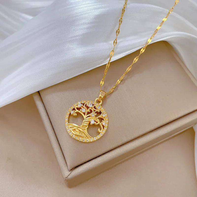 Gold-plated rhinestone and zircon cross necklace with a white mother-of-pearl pendant on a stainless steel chain.
