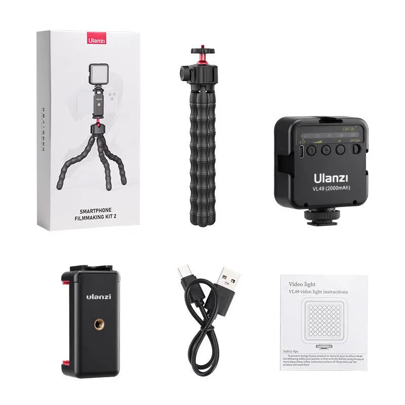 Compact aluminium tripod in folded and extended positions for smartphone vlogging.