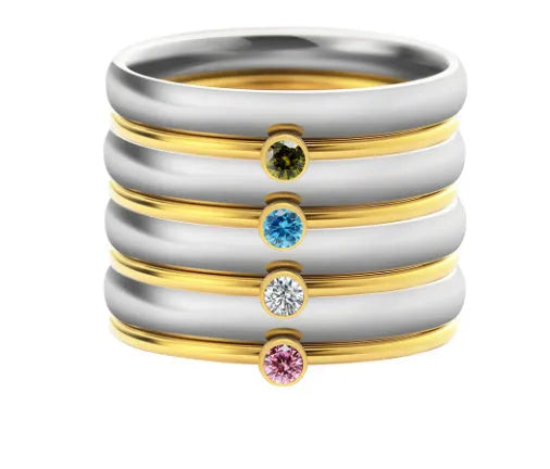 December colour birthstone engraved on a geometric titanium steel ring.