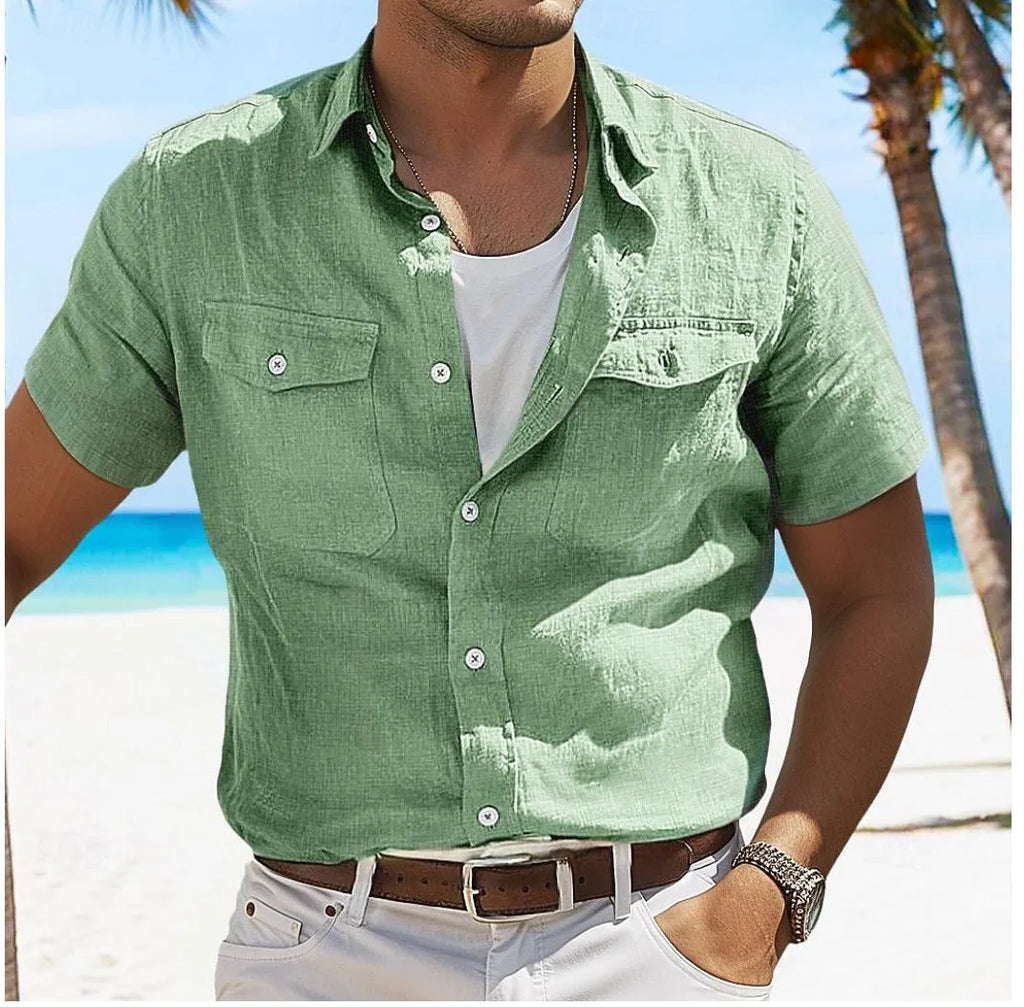 Men's grey loose fit long sleeve linen shirt with a polo collar on a plain background.