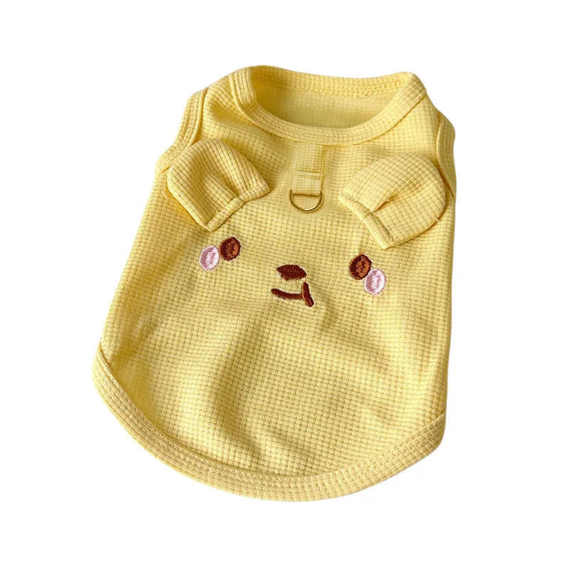 Yellow waffle knit dog vest on mannequin showing textured fabric and casual design