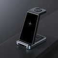 X2 three-in-one wireless charger in black charging a phone, watch, and earbuds