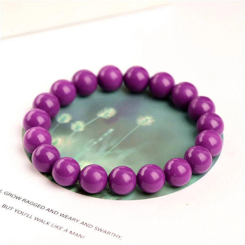 Jiuya purple mica crystal bracelet with polished beads in an original unisex design.