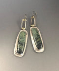 Geometric two-tone marble pattern alloy earrings with simple modern design