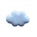 Resin cartoon cloud car fragrance clip in pastel colours mounted on vehicle air vent