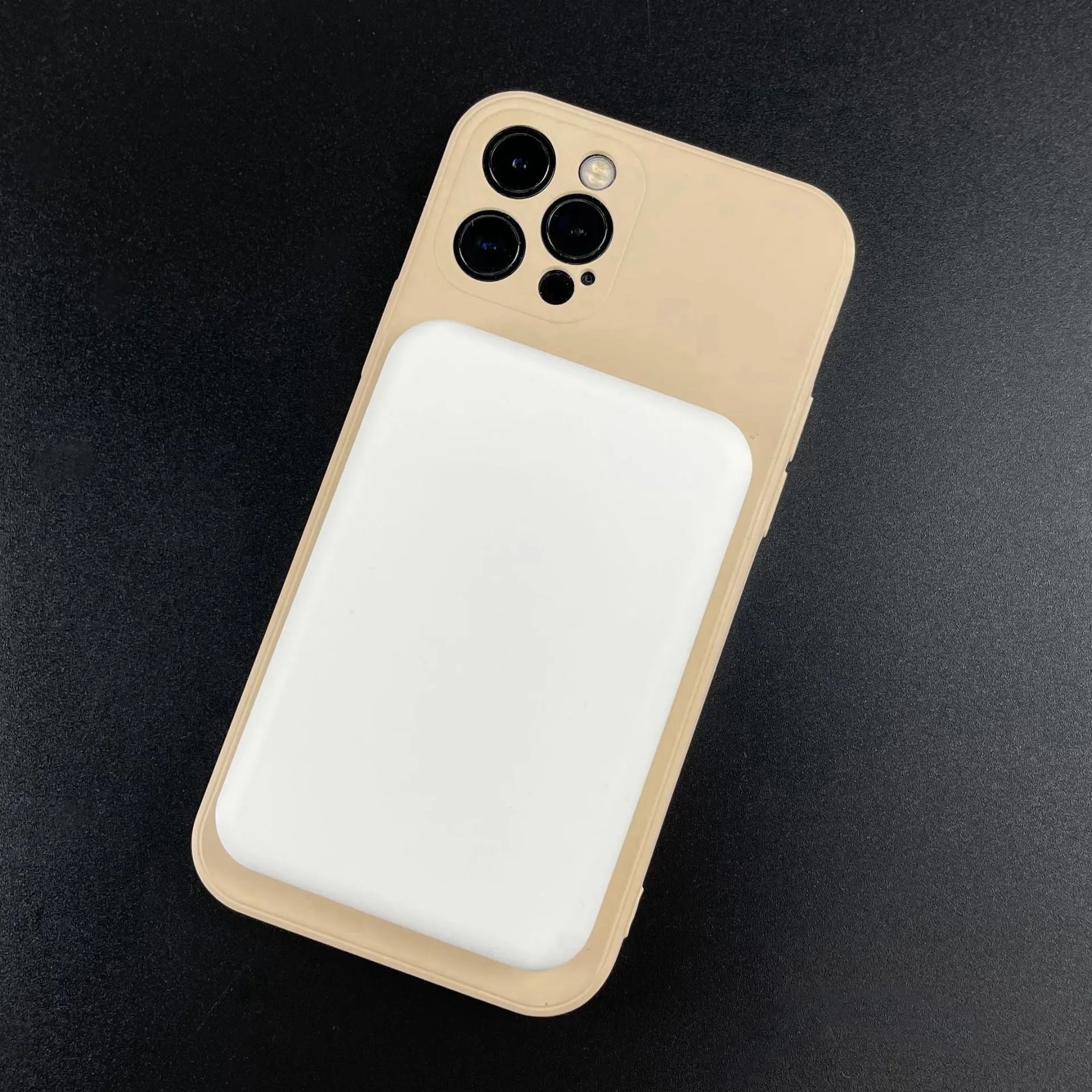 White magnetic wireless charging power bank with 5000mAh capacity on a table.
