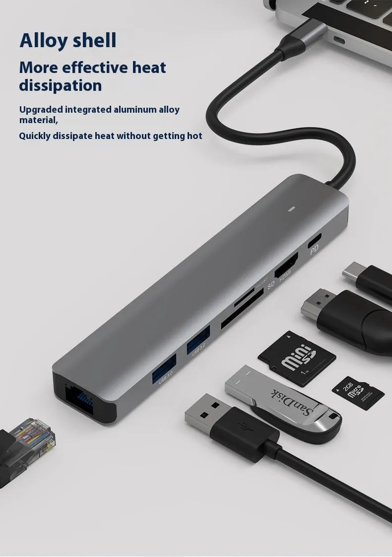 LQT-LH07 7-in-1 USB-C computer hub with card readers and charging port on a desk.
