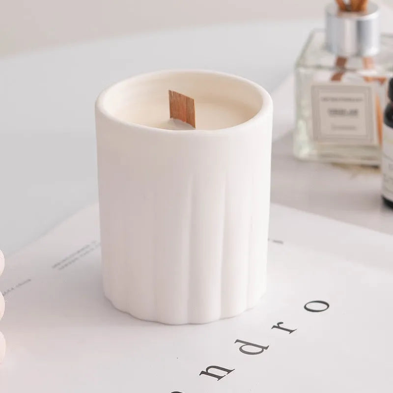 Minimalist relief ceramic candlestick round shape semi-handmade on dining table