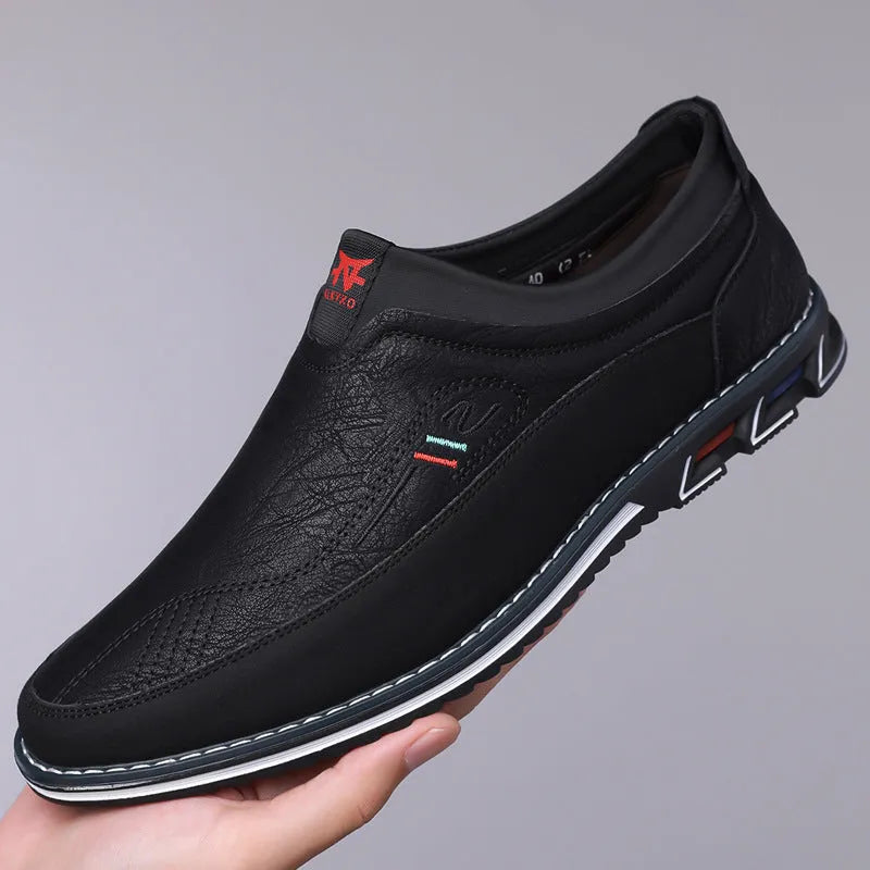 Men's low-top casual leather shoes in orange with a leather toe cap and rubber sole.
