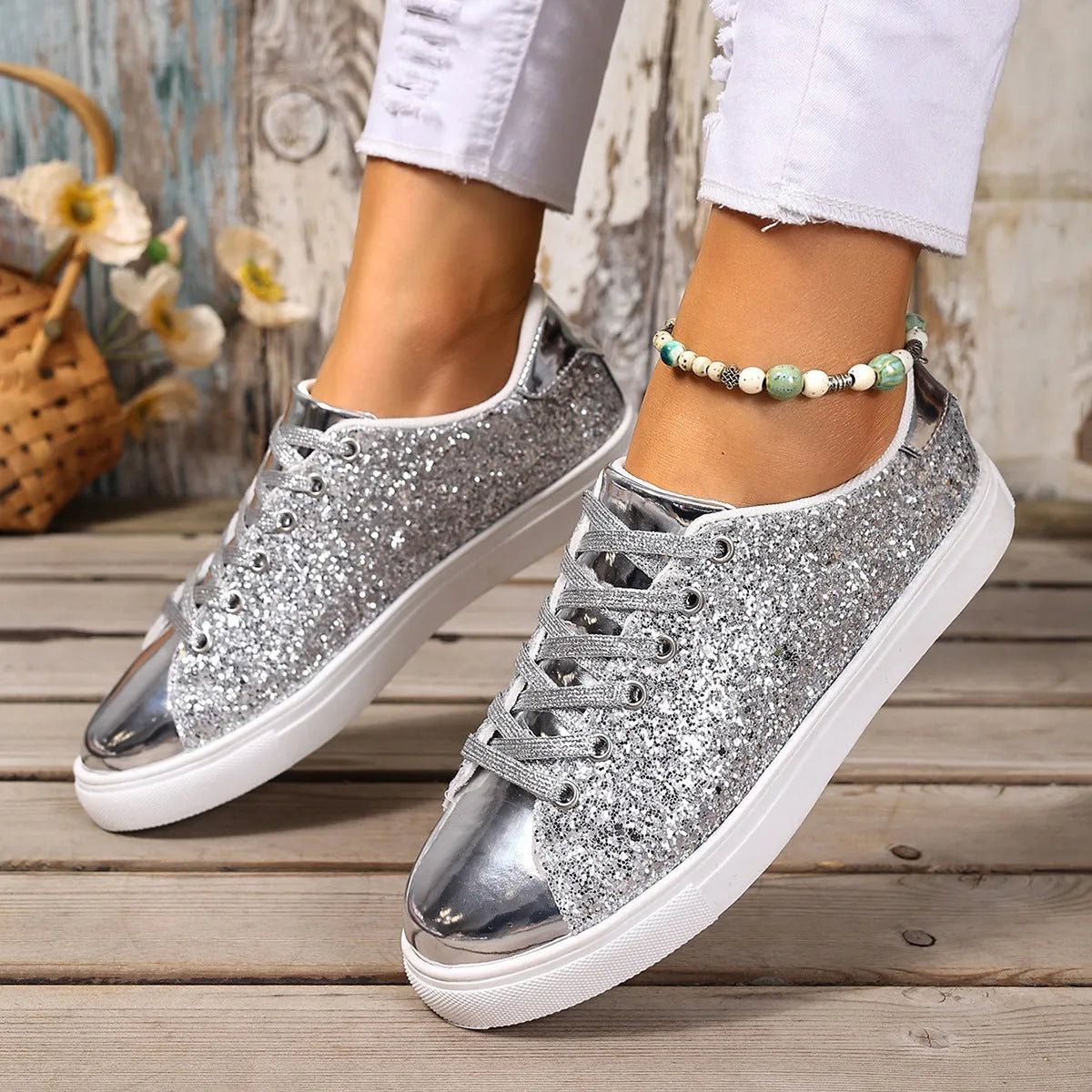 Women's plus size black sequined flat board shoes with front lace-up detail.