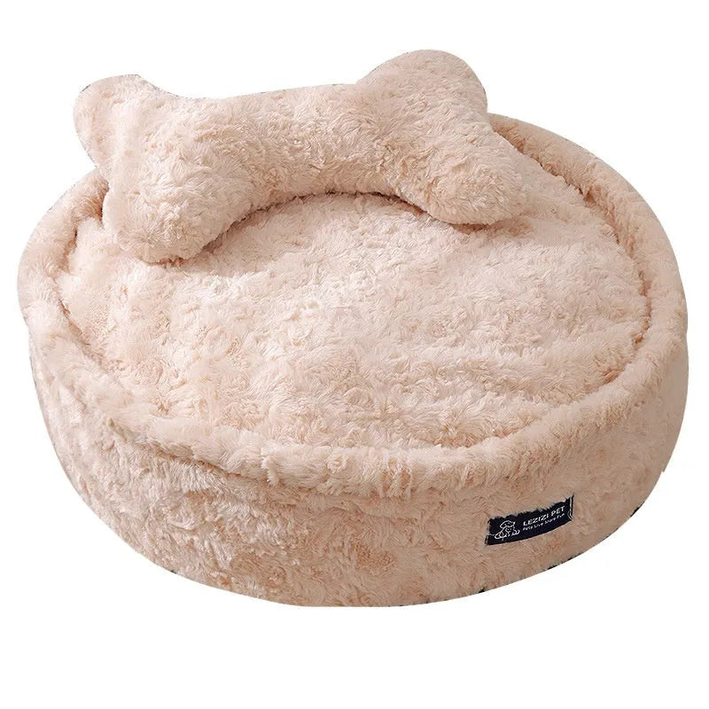 Round nest pet bed with a removable cover in a milk tea colour on a wooden floor