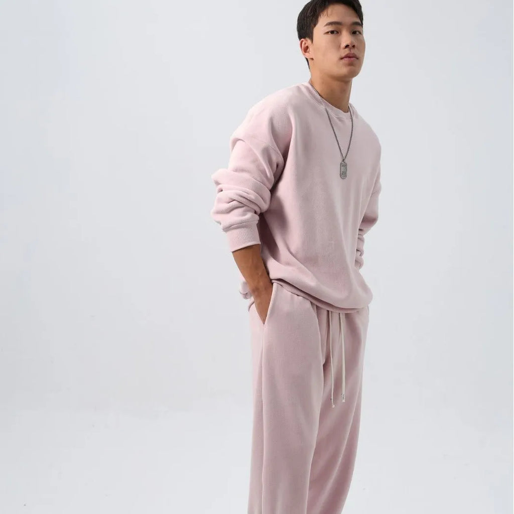Men's polar fleece sports suit with loose long sleeve coat and matching trousers in winter colours
