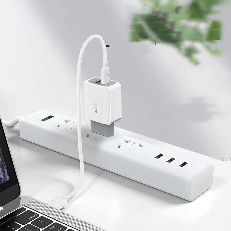 White phone fast charge charger set with European standard USB cable on a plain background
