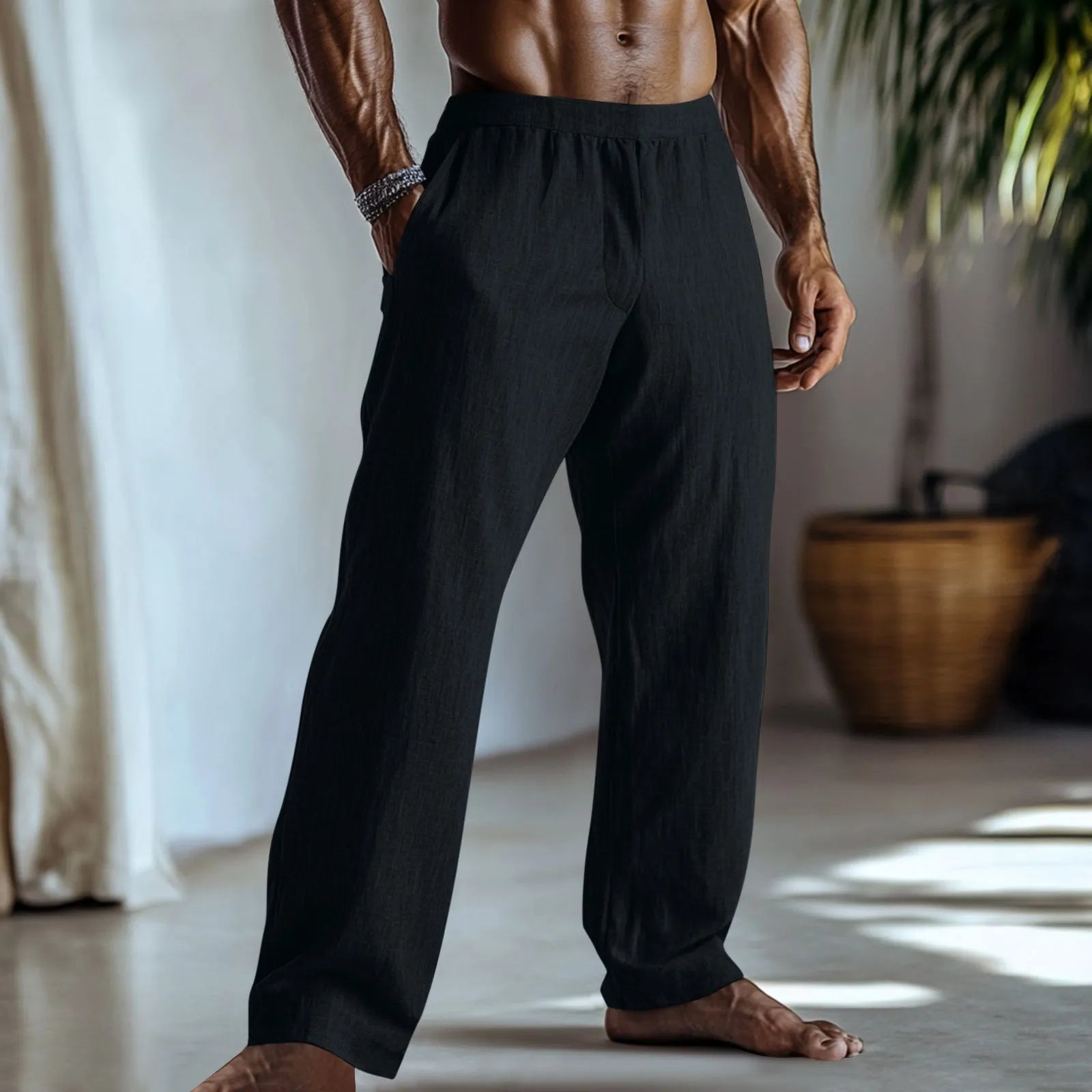 Cotton and linen straight-leg casual trousers in a solid colour with visible pockets.