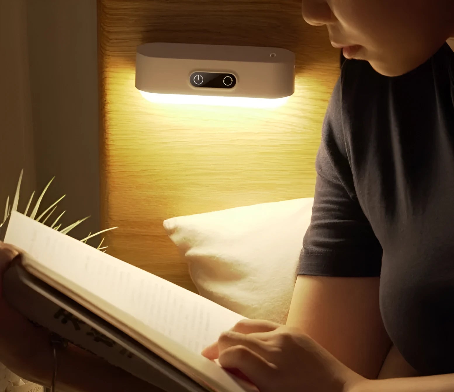 White USB rechargeable magnetic LED night light with touch controls on a metal study cabinet.