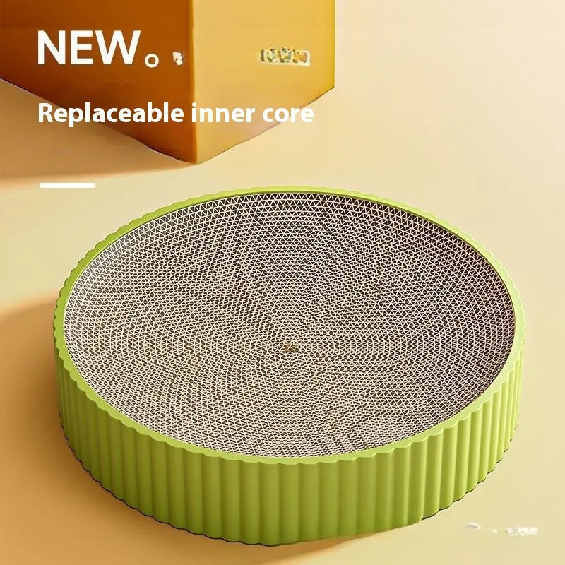 Round green and white corrugated paper cat scratching board and nest, 55cm diameter, with replacement refills.