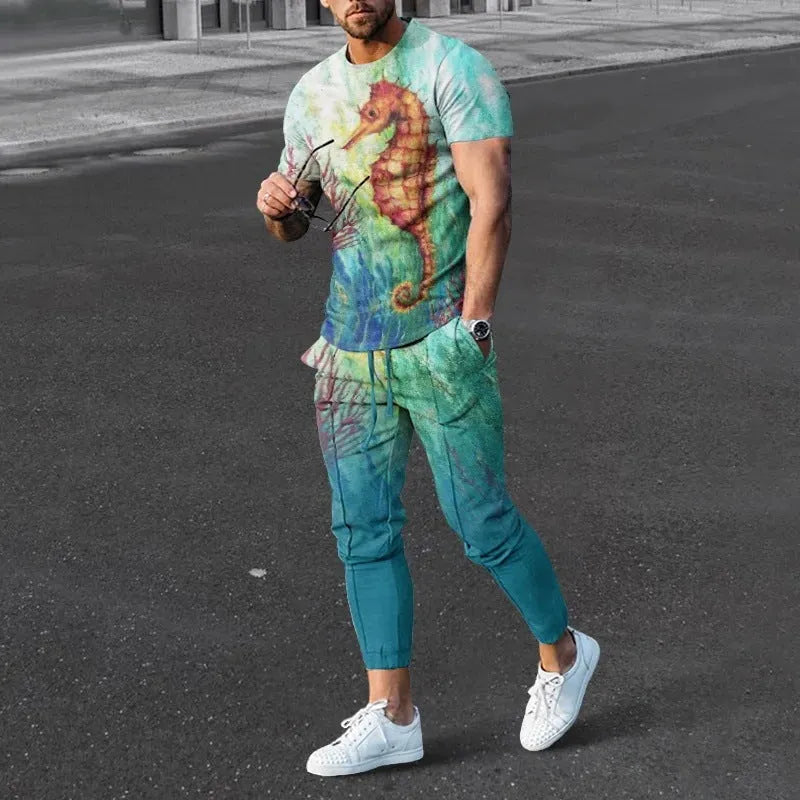 Man wearing a short-sleeved printed pullover and matching trousers from a lightweight polyester casual set.
