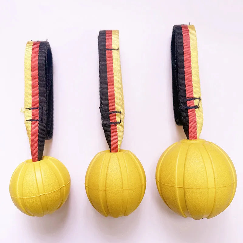 EVA floating knot ball for dog water training in camouflage and yellow colours with tether attachment