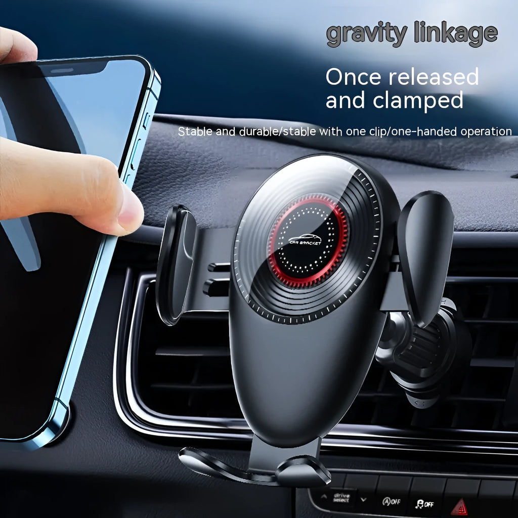 Black universal car phone bracket mounted on car air vent holding mobile phone
