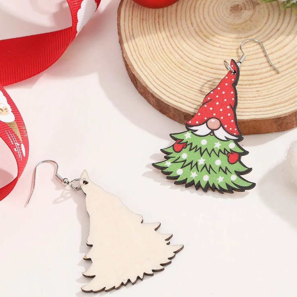 Wooden Christmas earrings with printed tree and snowman designs in festive colours