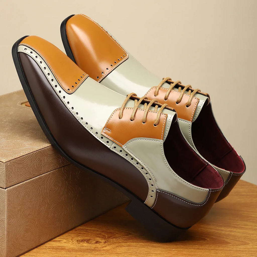 Men's low-top leather shoes in black, green, or purple with stitching detail and a leather toe cap.