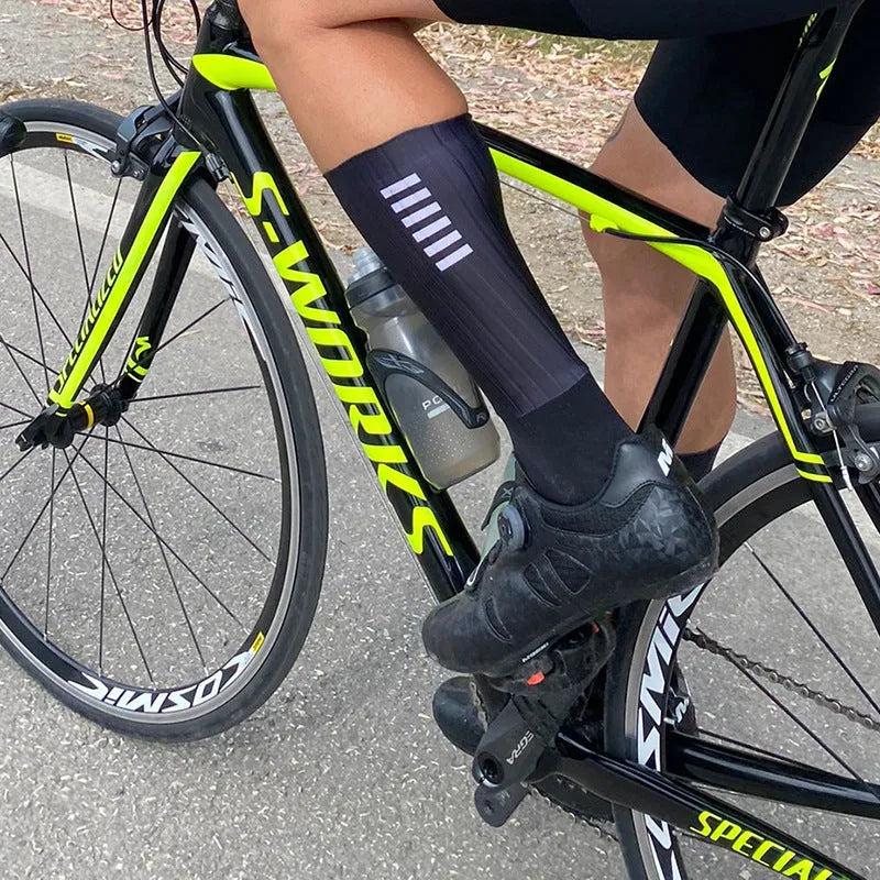 Cycling socks with moisture management fabric in six colour options for athletic use