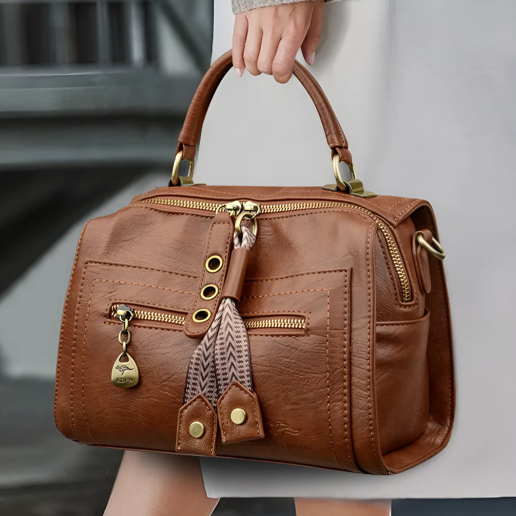 Soft PU leather women's crossbody bag in a horizontal square shape with a sandwich pocket.