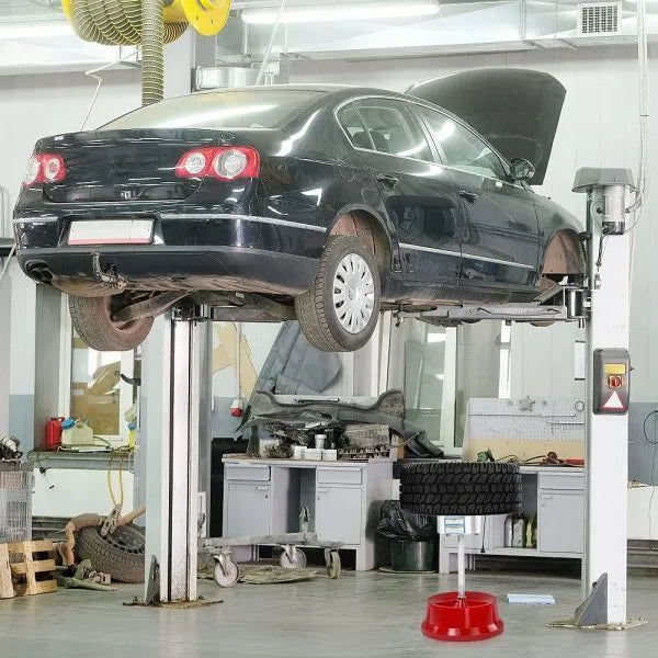 Portable wheel balancer with aluminium head and bull's eye level on enamel-finished base