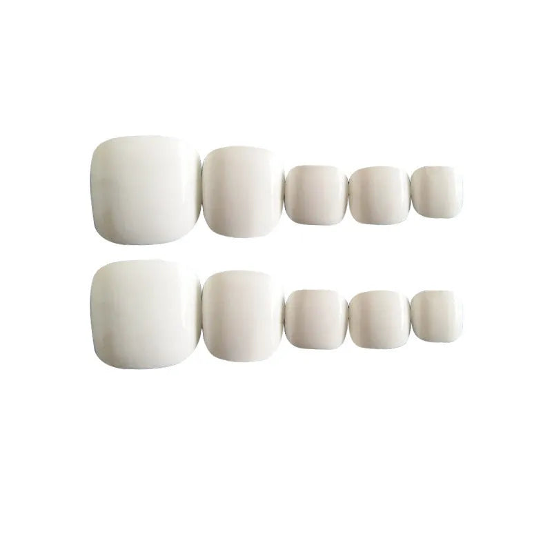 False nails set with starry sky pattern in white colour including adhesive glue
