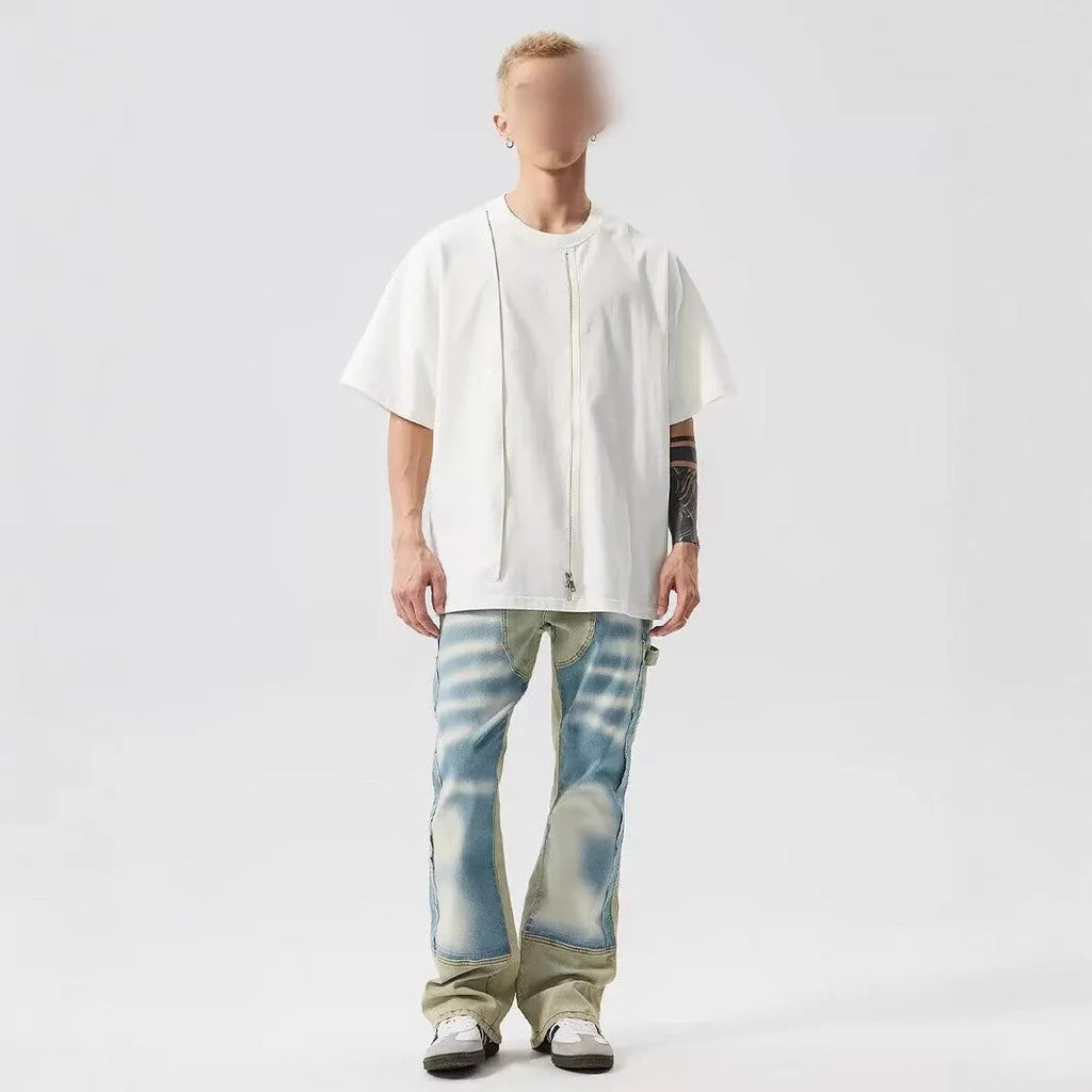 Yellow and blue retro patchwork jeans with splash-ink damaged design on denim