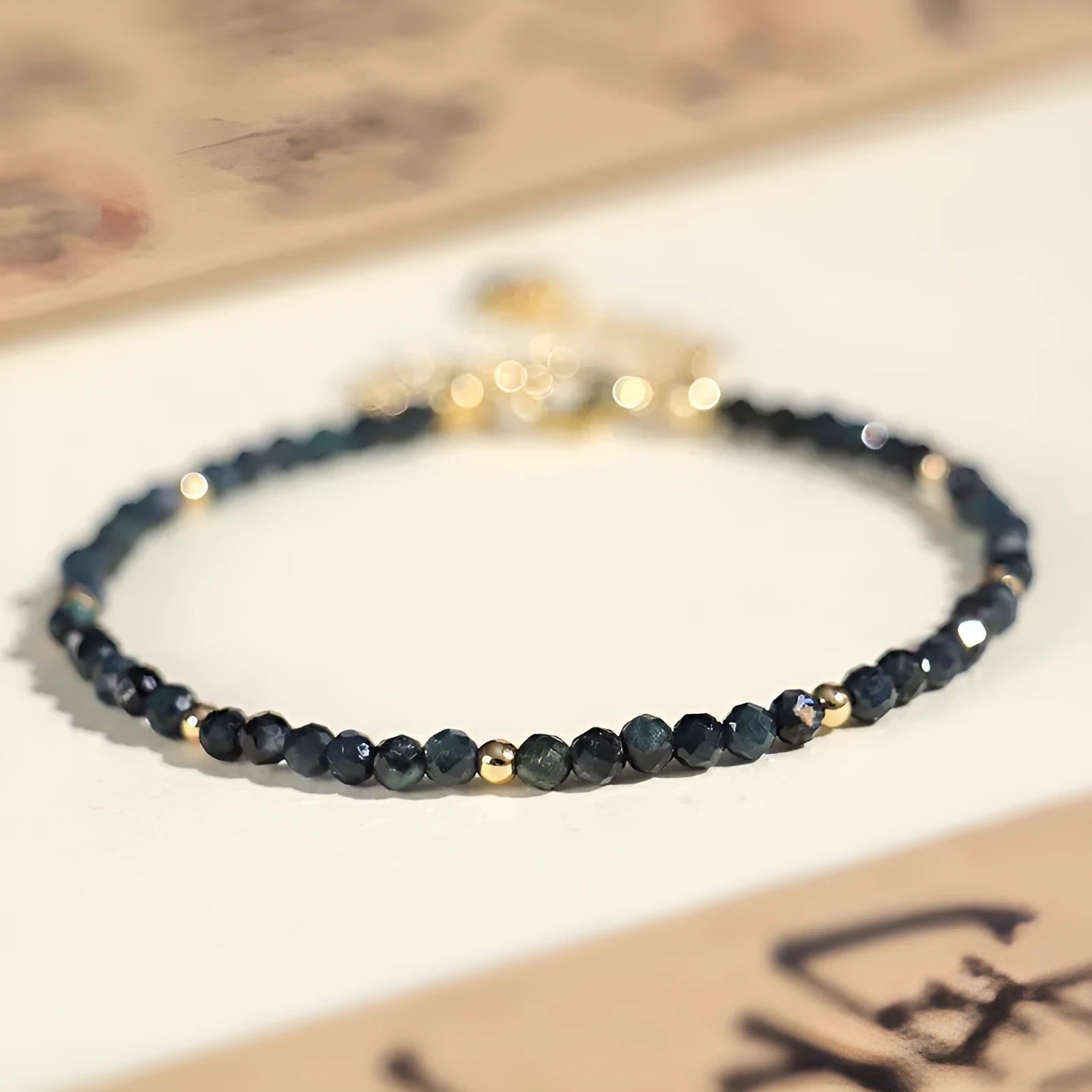 Blue tourmaline bracelet with 3mm beads and spacer design for women
