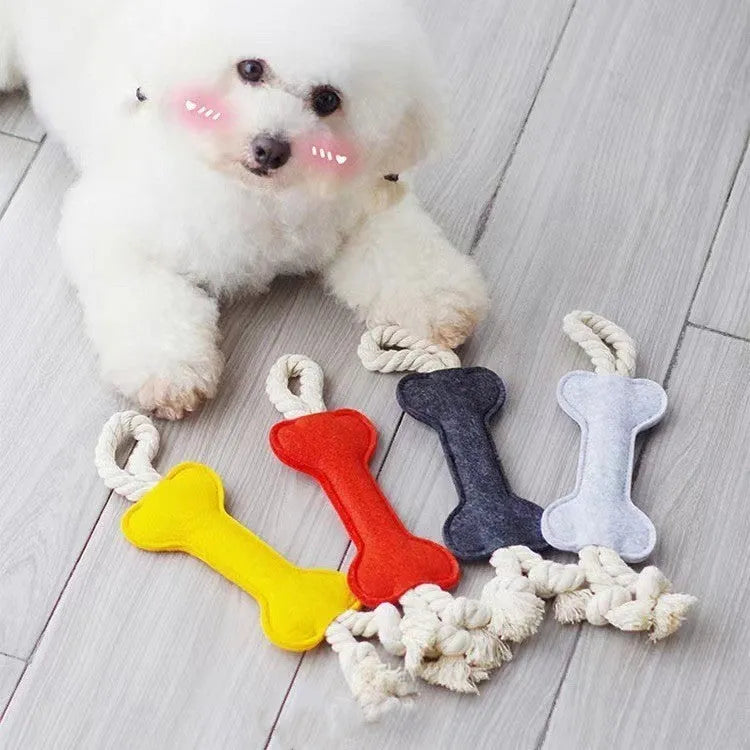 Blue bone-shaped dog chew toy made of felt fabric with visible rope knots.