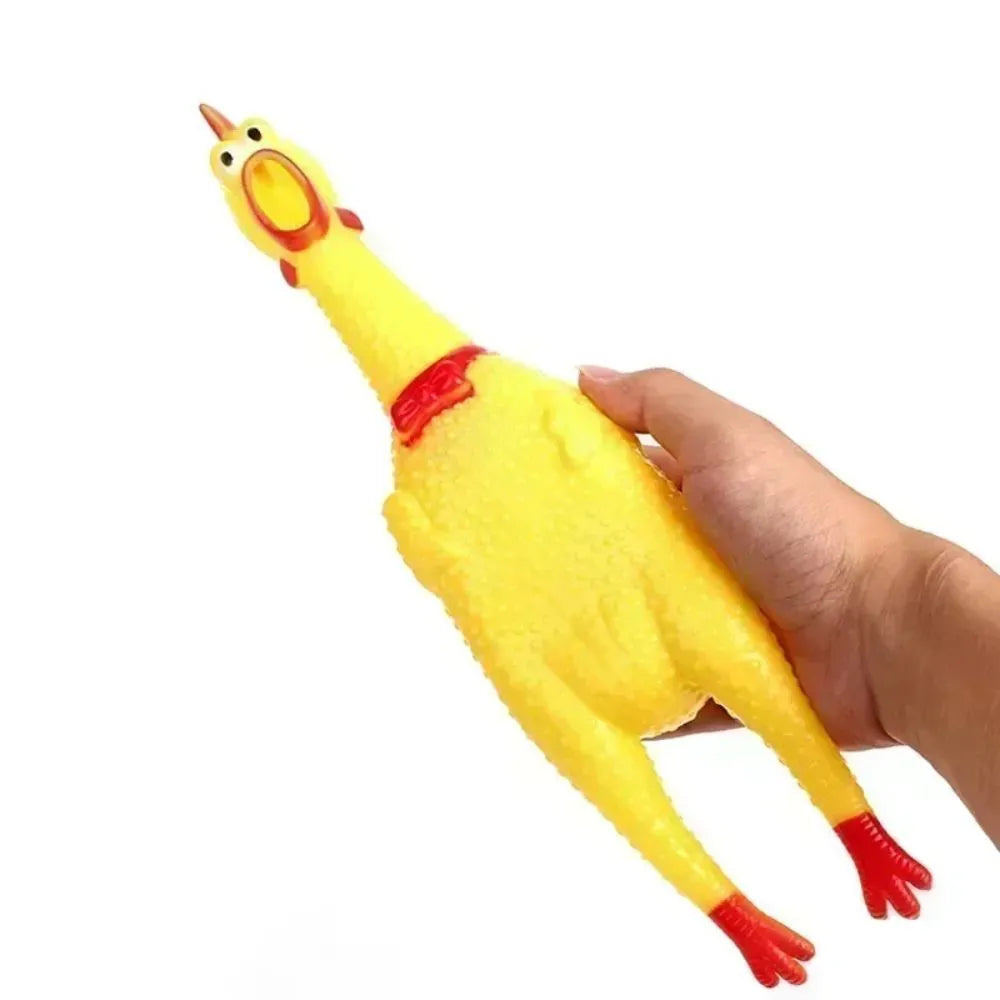 Yellow rubber Screaming Chicken dog squeak toy shown in three different sizes.
