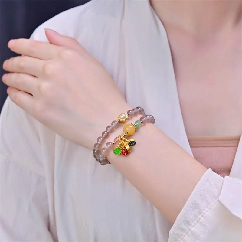 Women's two-circle bracelet made with natural gray agate beads in a retro style.