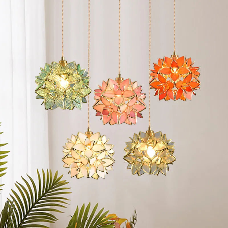 Hanging line lamp chandelier with copper construction and glass elements in bedroom setting