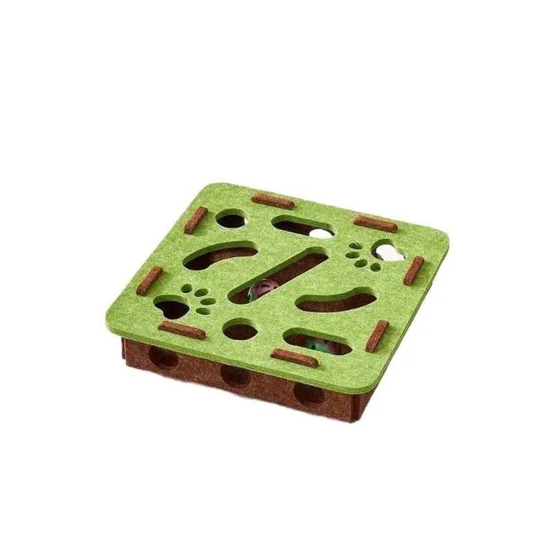 Green brown felt cube cat toy with holes for pet play and boredom relief.