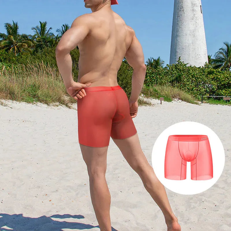 Men's solid colour boxer briefs in nylon ice silk fabric on a plain background.