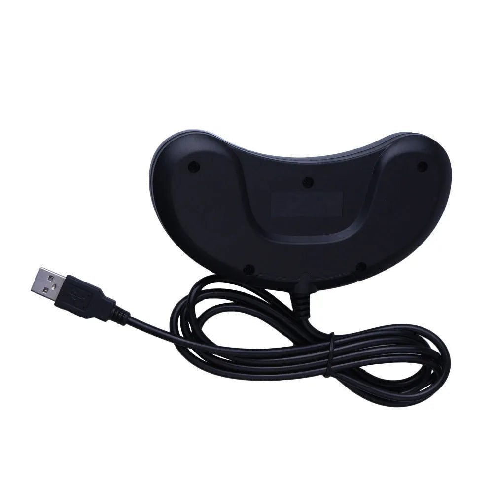 Black Sega USB wired PC gaming controller with 1.8 metre cable on a desk.