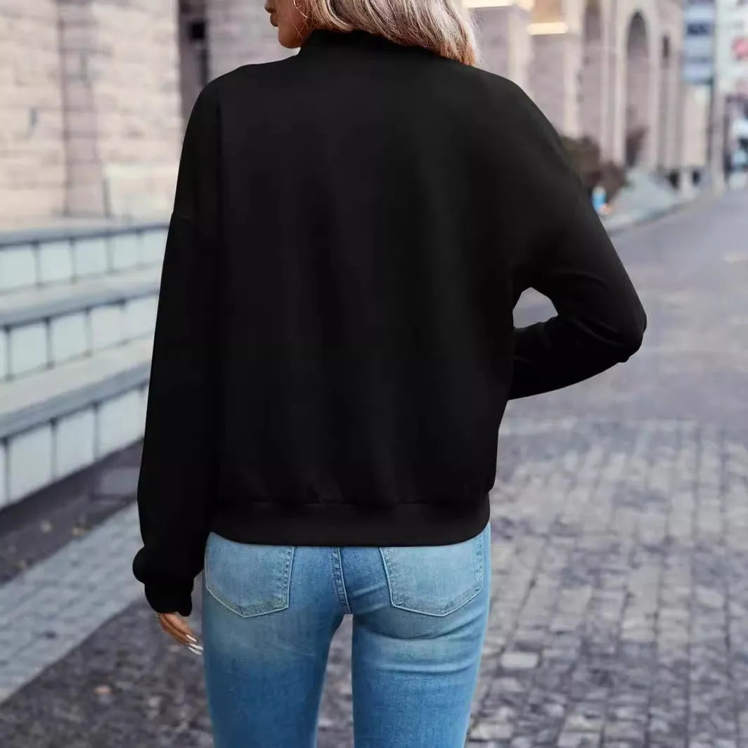Black women's long sleeve zip jacket with faux pockets for casual autumn winter wear.
