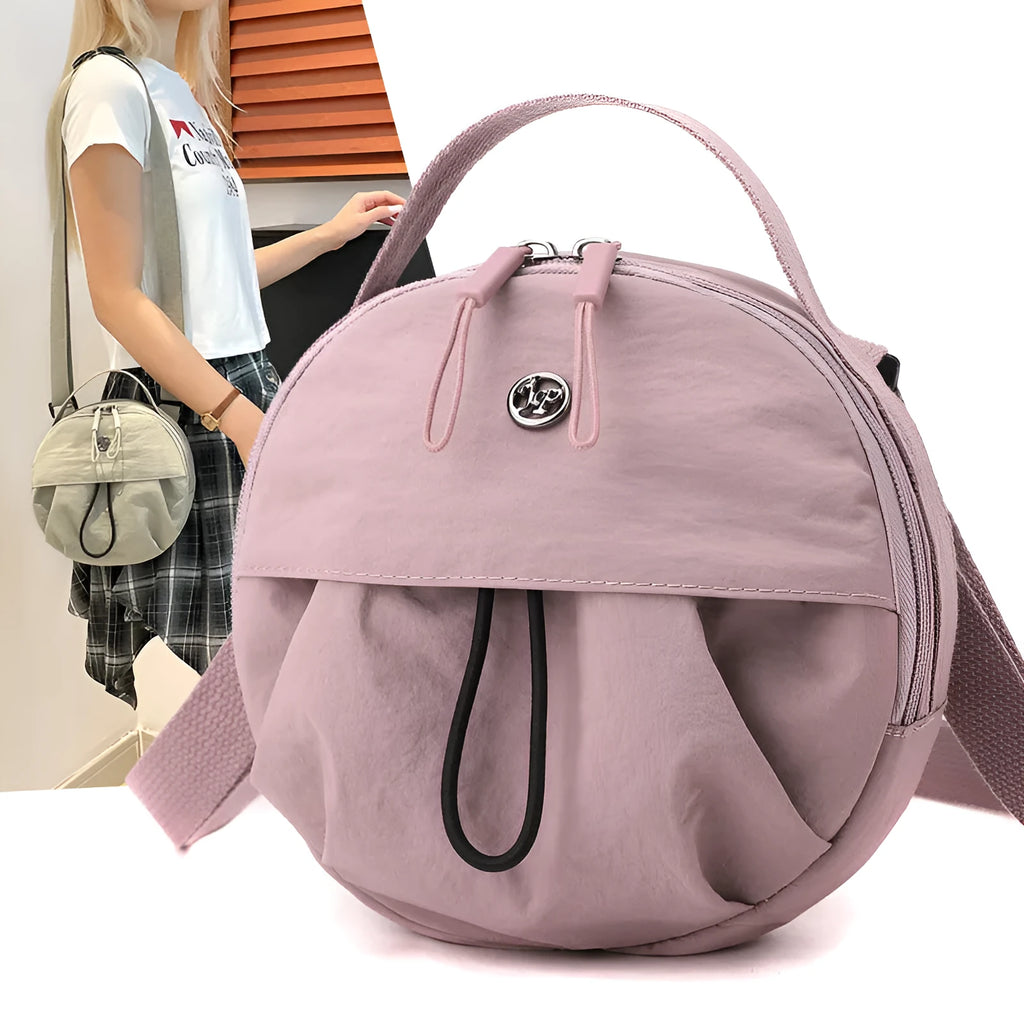 Nylon crossbody messenger bag in urban style with internal organisers, shown in a selection of colours.