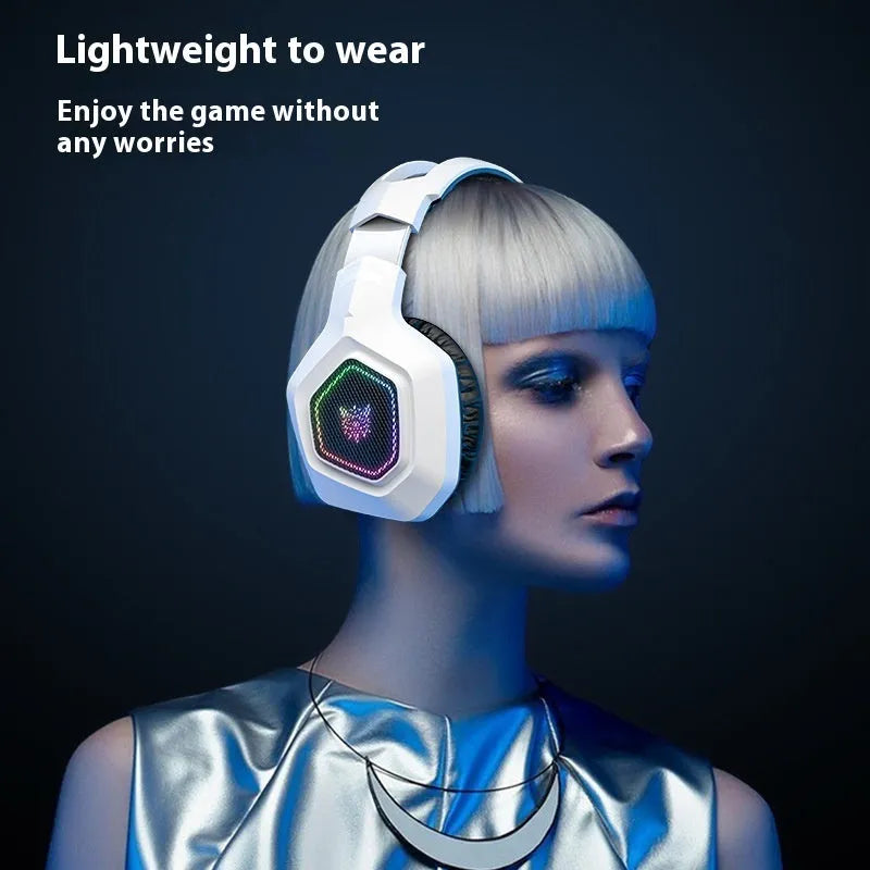 Black and white wireless gaming headset with RGB lights, showing 2.4G receiver and charging cable.
